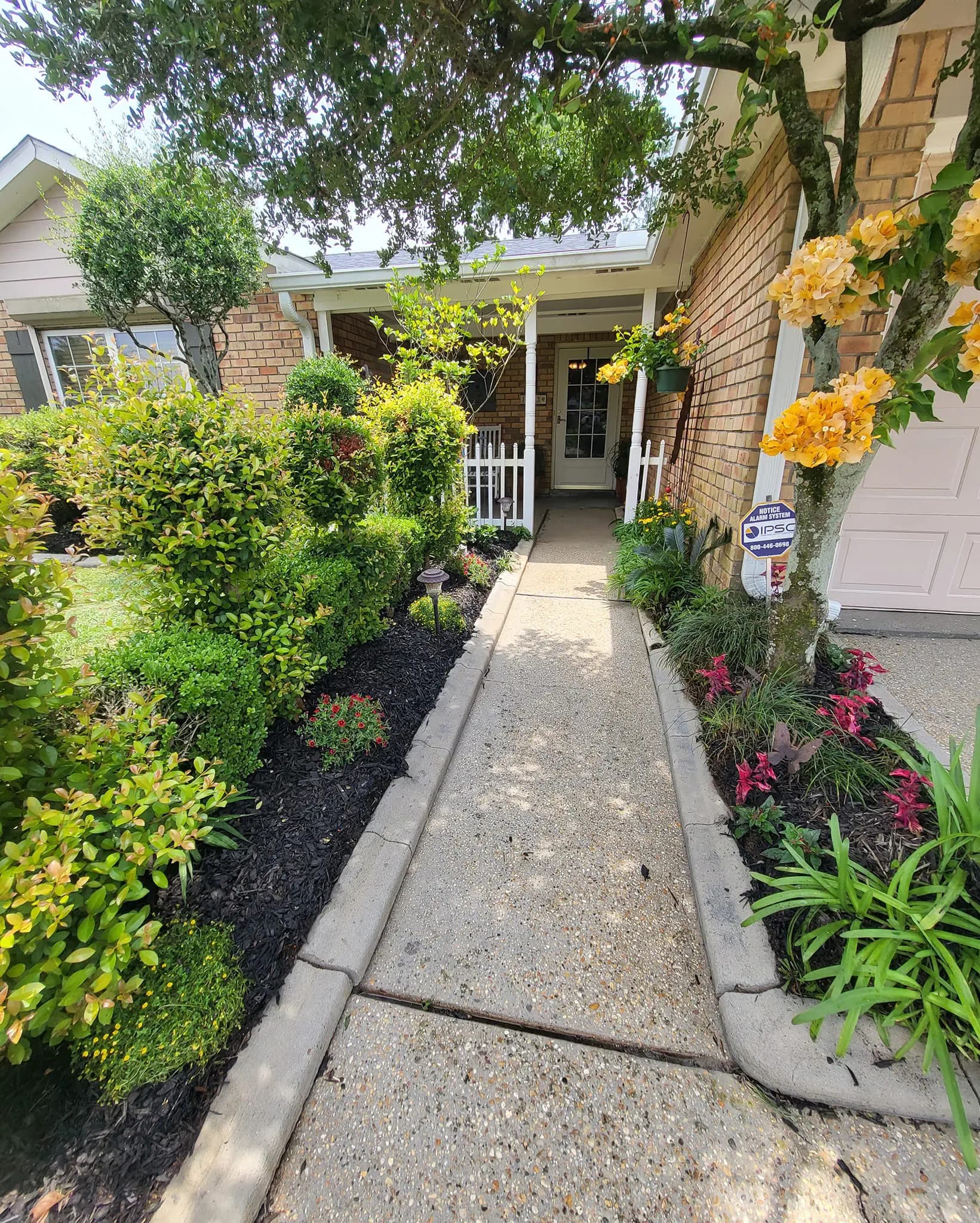 Clean front porch and sidewalk after pressure washing