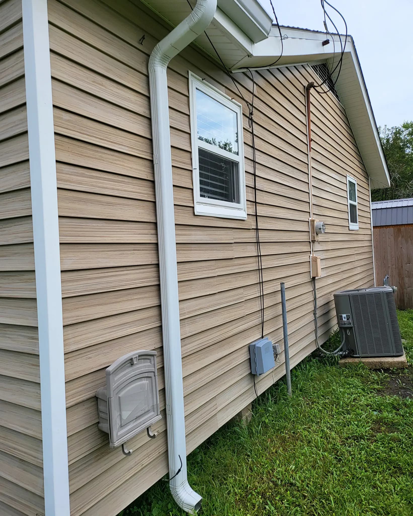 Clean siding after pressure washing